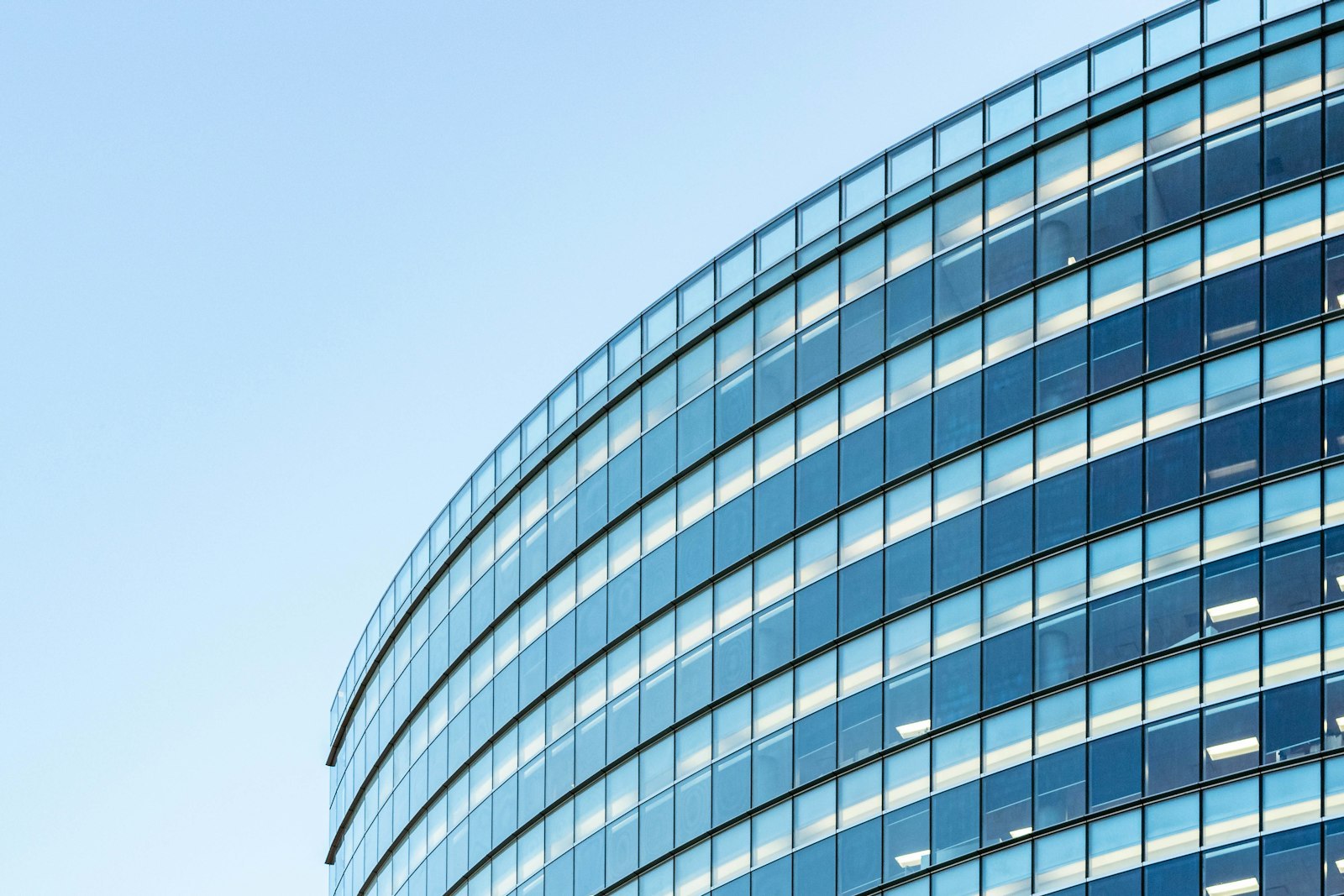 A modern glass-fronted commercial office building